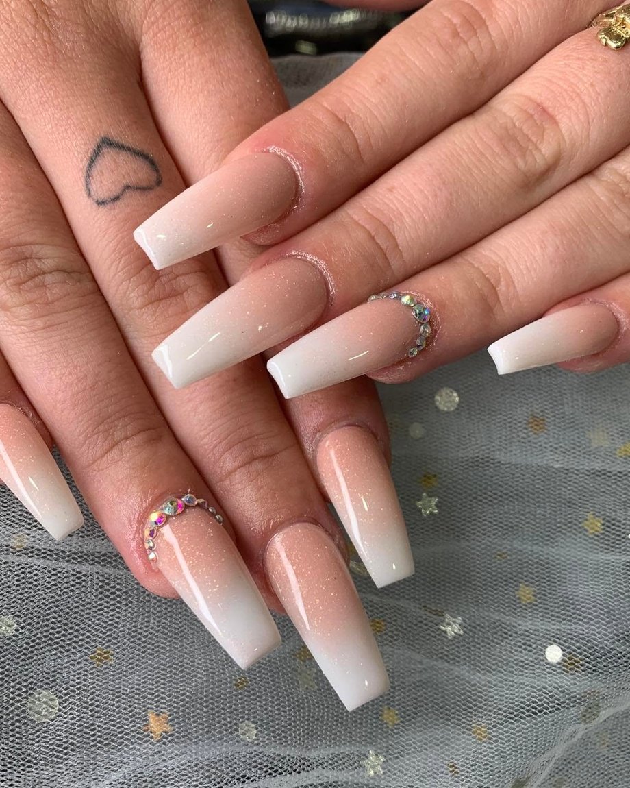 Nude ombr&eacute; coffin manicure with crystal details by Pearl Spa