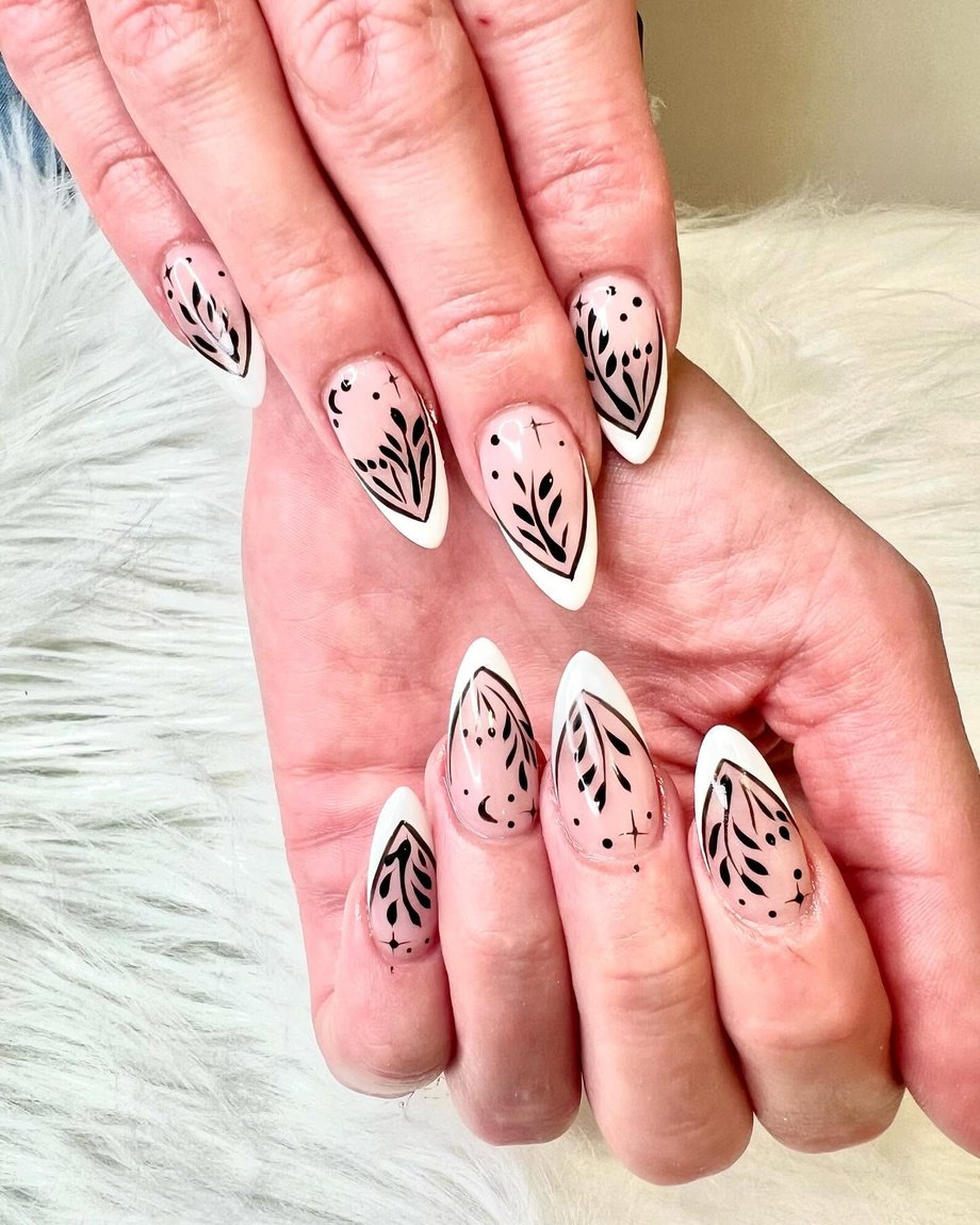 Almond nails with floral nail art by Pearl Spa